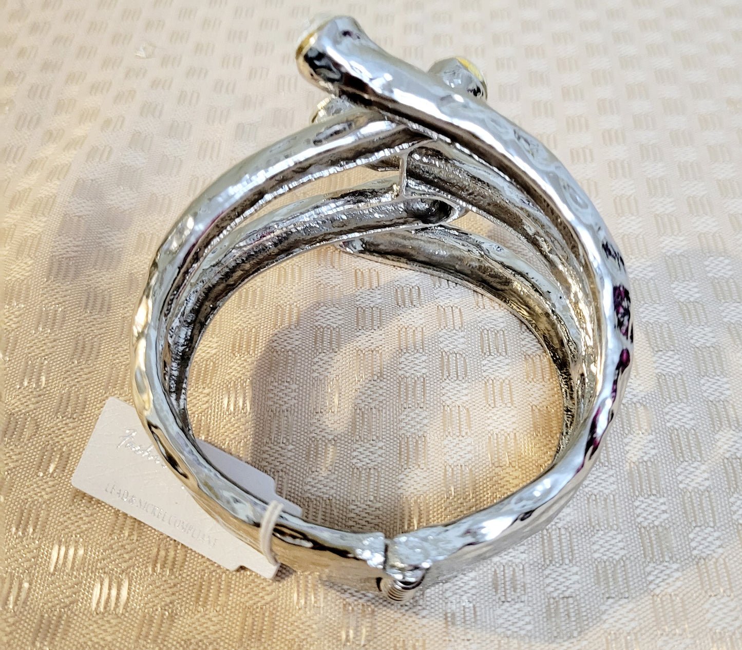 Silvertone claw bracelet